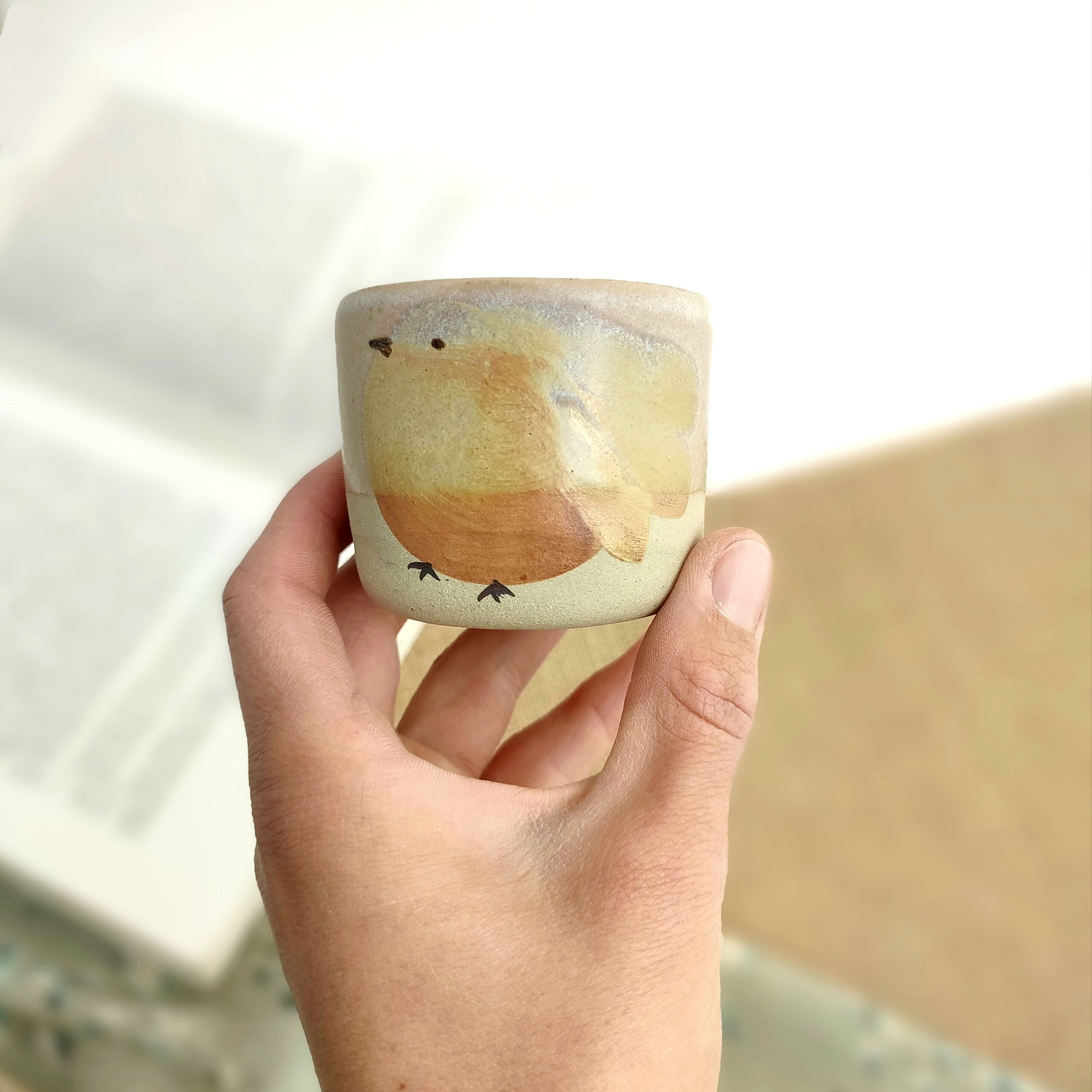 Tasse illustrée en grès