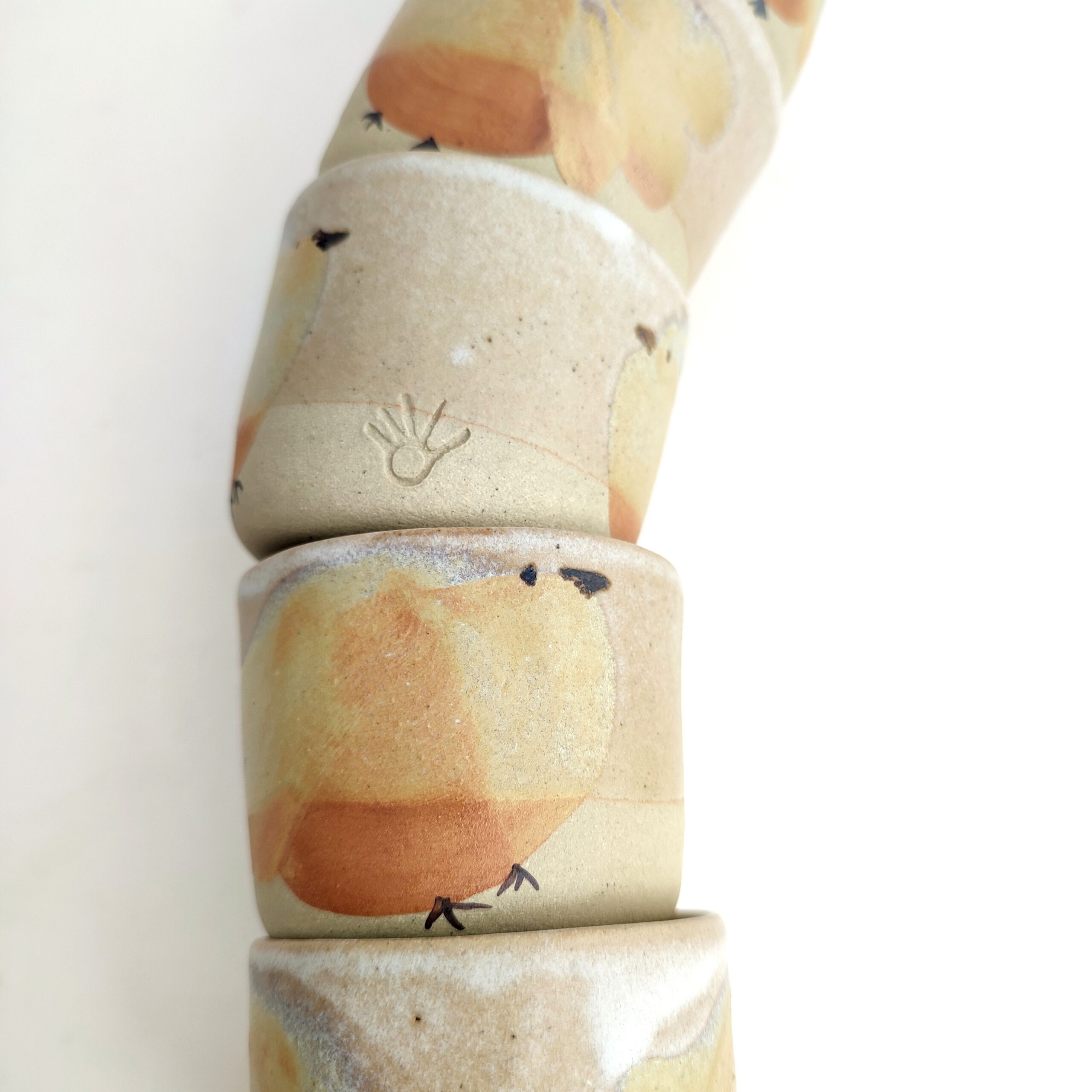 Tasse illustrée en grès