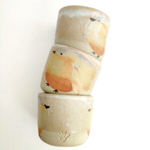 Tasse à café illustrée en grès